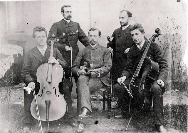 Jean G P in band.jpg - My great great grandfather is on the right playing the cello, Jean Baptiste Preuveneers (1866-1911), the Belgian who came to England in about 1900 to play in the London Philharmonic Orchestra.